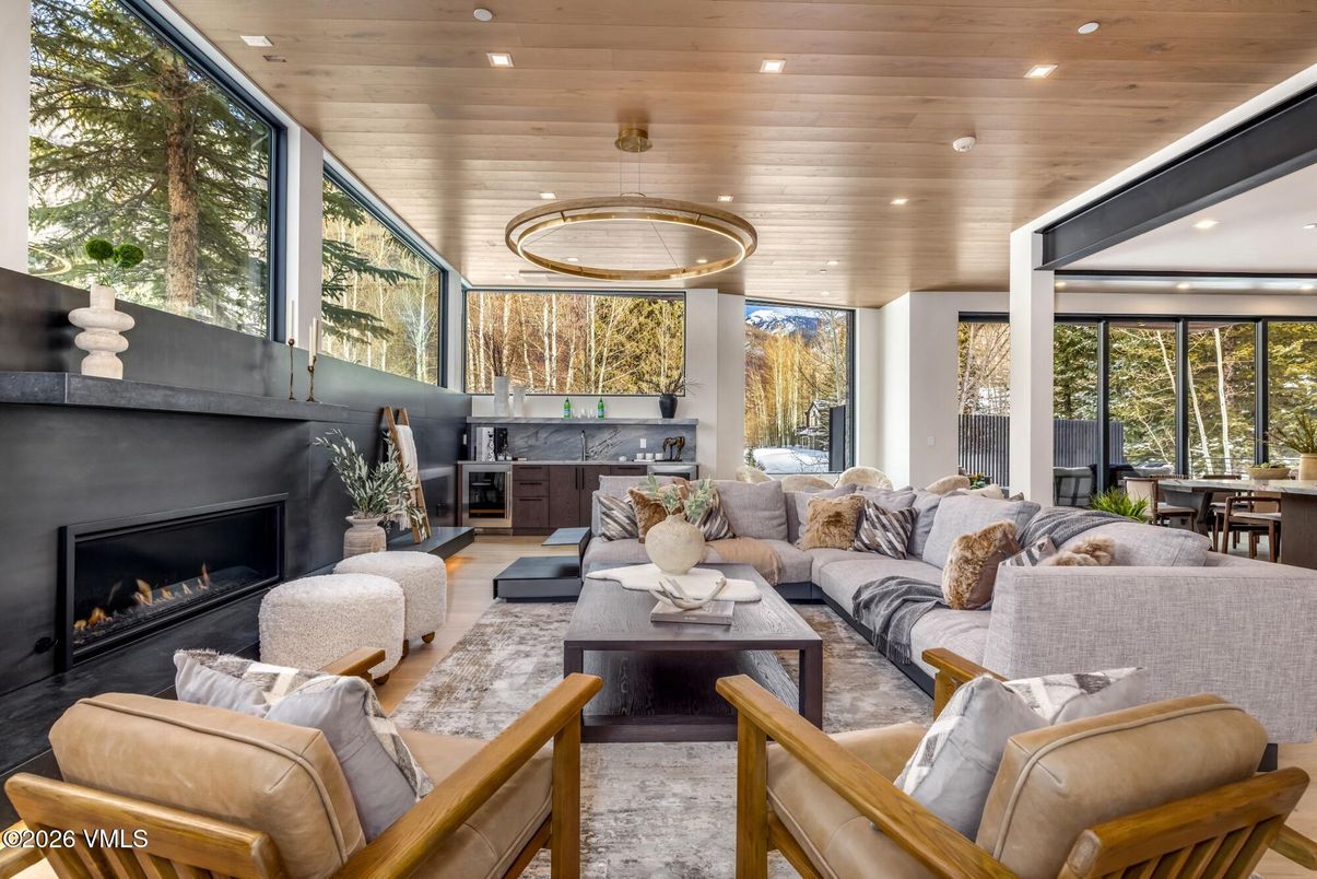 Fireplace, Interior, Living room, Pendant Lights, Recessed Lighting, Wooden Ceilings, Wood Texture Flooring