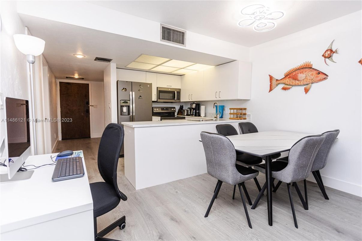 Dining room, Interior, Kitchen, Recessed Lighting, Stainless Steel Appliances, Wood Texture Flooring