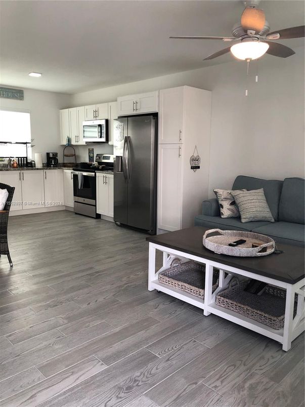 Interior, Kitchen, Living room, Recessed Lighting, Stainless Steel Appliances, Wood Texture Flooring