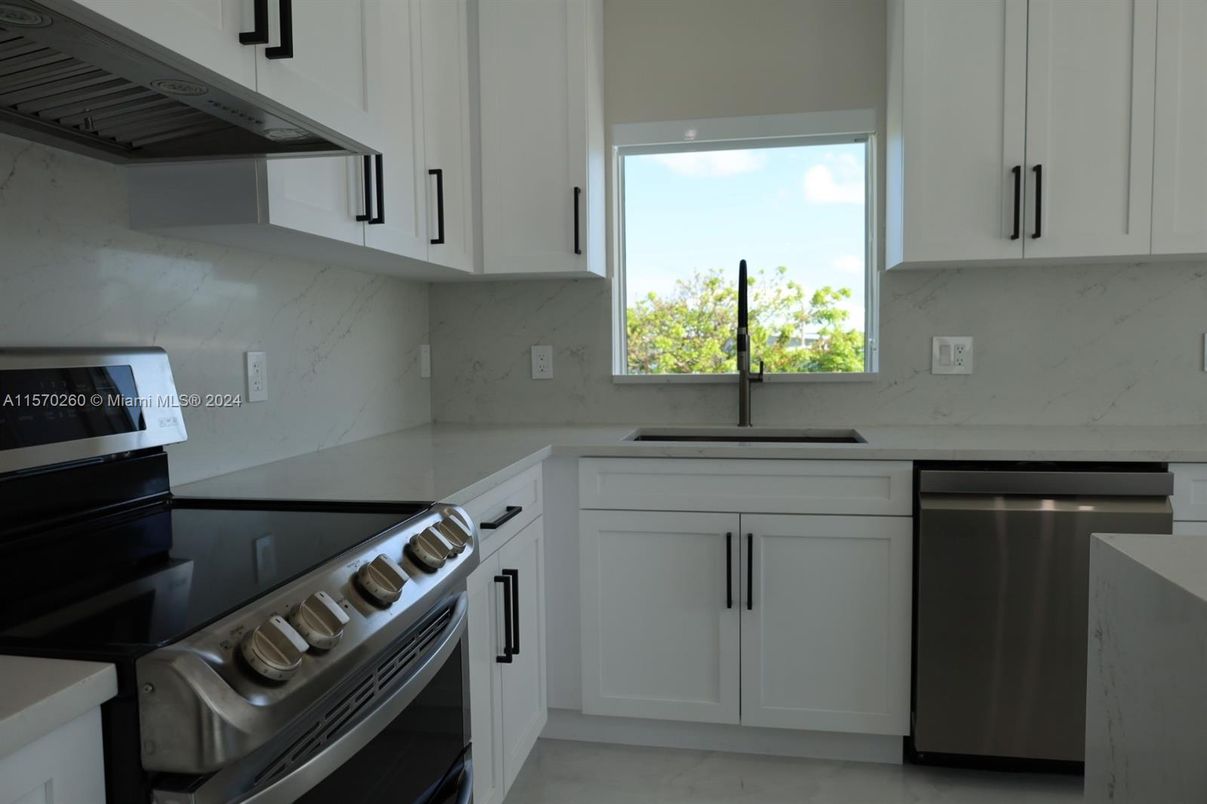 Interior, Kitchen, Marble Walls, Stainless Steel Appliances