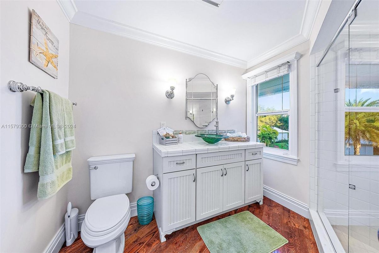 Bathroom, Glass Shower, Interior, Tile Countertops, Wood Texture Flooring
