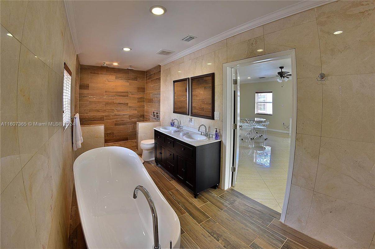 Bathroom, Dual Sink Vanities, Free Standing Baths, Interior, Recessed Lighting, Wood Texture Flooring, Wooden Walls