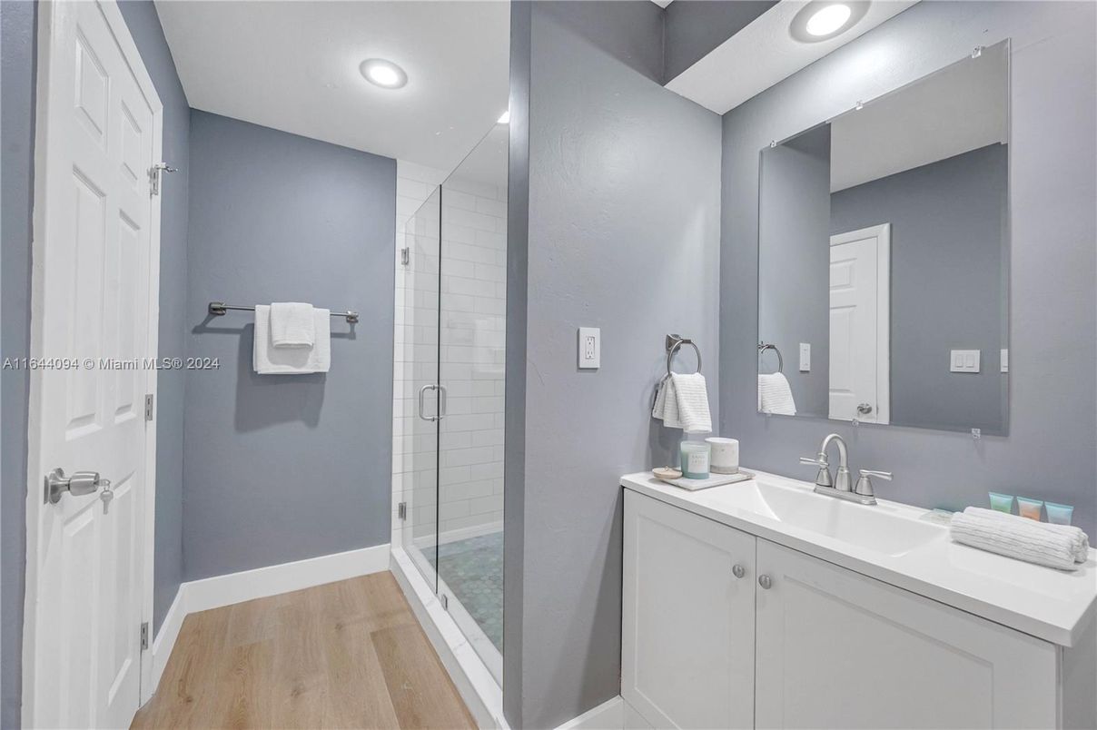 Bathroom, Glass Shower, Interior, Recessed Lighting, Wood Texture Flooring