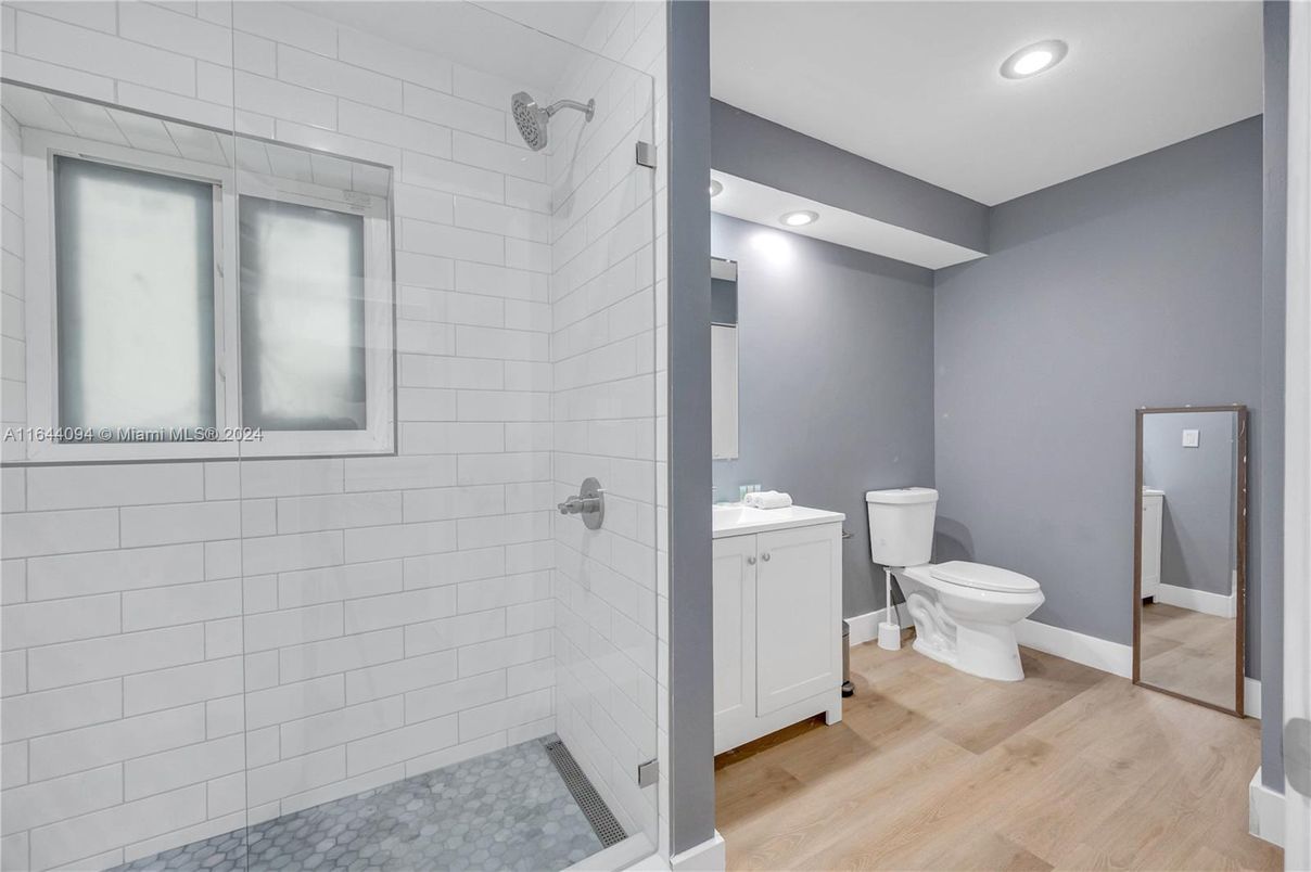 Bathroom, Glass Shower, Interior, Recessed Lighting, Wood Texture Flooring