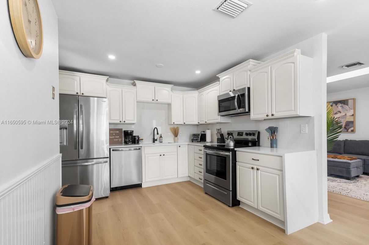 Interior, Kitchen, Recessed Lighting, Stainless Steel Appliances, Wood Texture Flooring