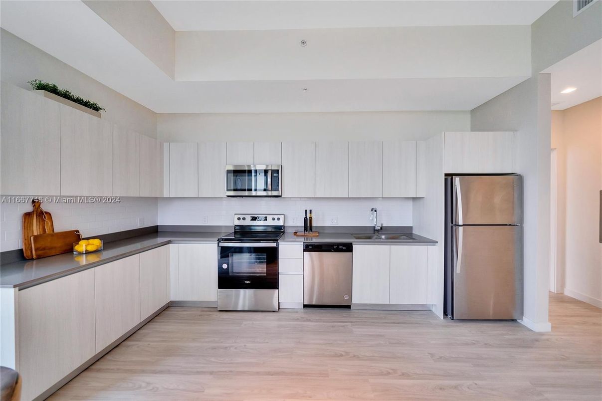 Interior, Kitchen, Recessed Lighting, Stainless Steel Appliances, Wood Texture Flooring