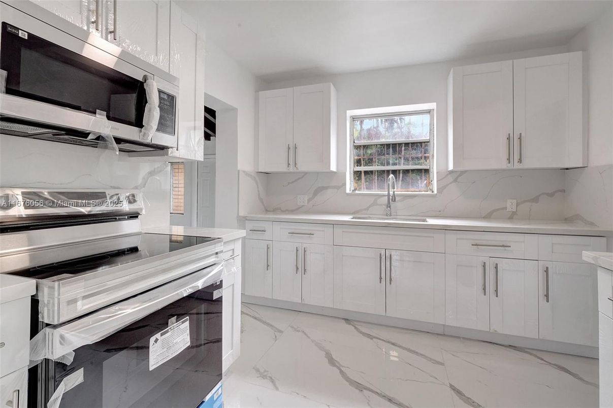 Interior, Kitchen, Marble, Marble Walls, Stainless Steel Appliances