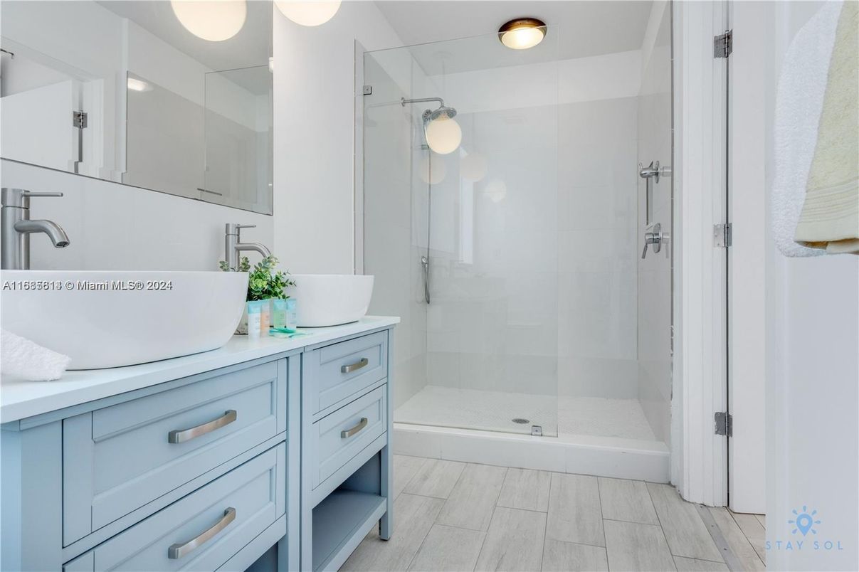 Bathroom, Dual Sink Vanities, Glass Shower, Interior, Wood Texture Flooring