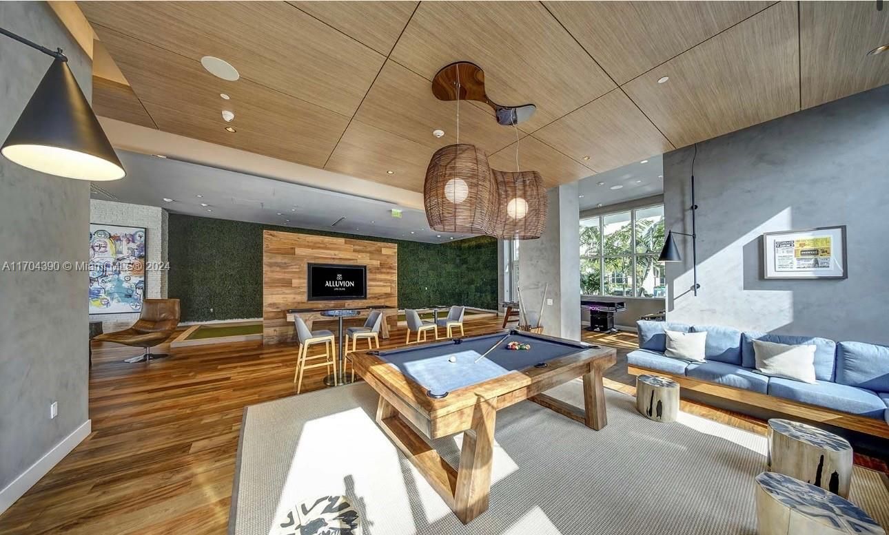 Billiard Table, Fireplace, Game Room, Interior, Living room, Pendant Lights, Recessed Lighting, Wooden Ceilings, Wood Texture Flooring, Wooden Walls