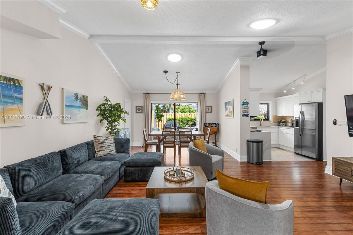 Dining room, Interior, Kitchen, Living room, Pendant Lights, Recessed Lighting, Stainless Steel Appliances, Wood Texture Flooring