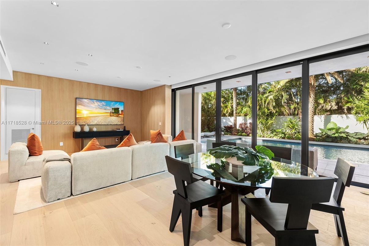 Dining room, Interior, Living room, Recessed Lighting, Water, Wood Texture Flooring, Wooden Walls