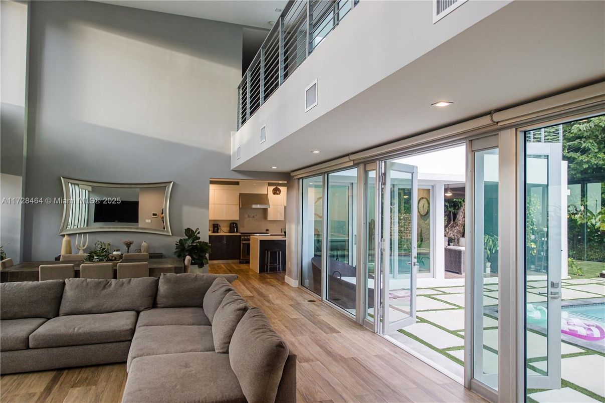 Dining room, Interior, Kitchen, Living room, Recessed Lighting, Stainless Steel Appliances, Wood Texture Flooring