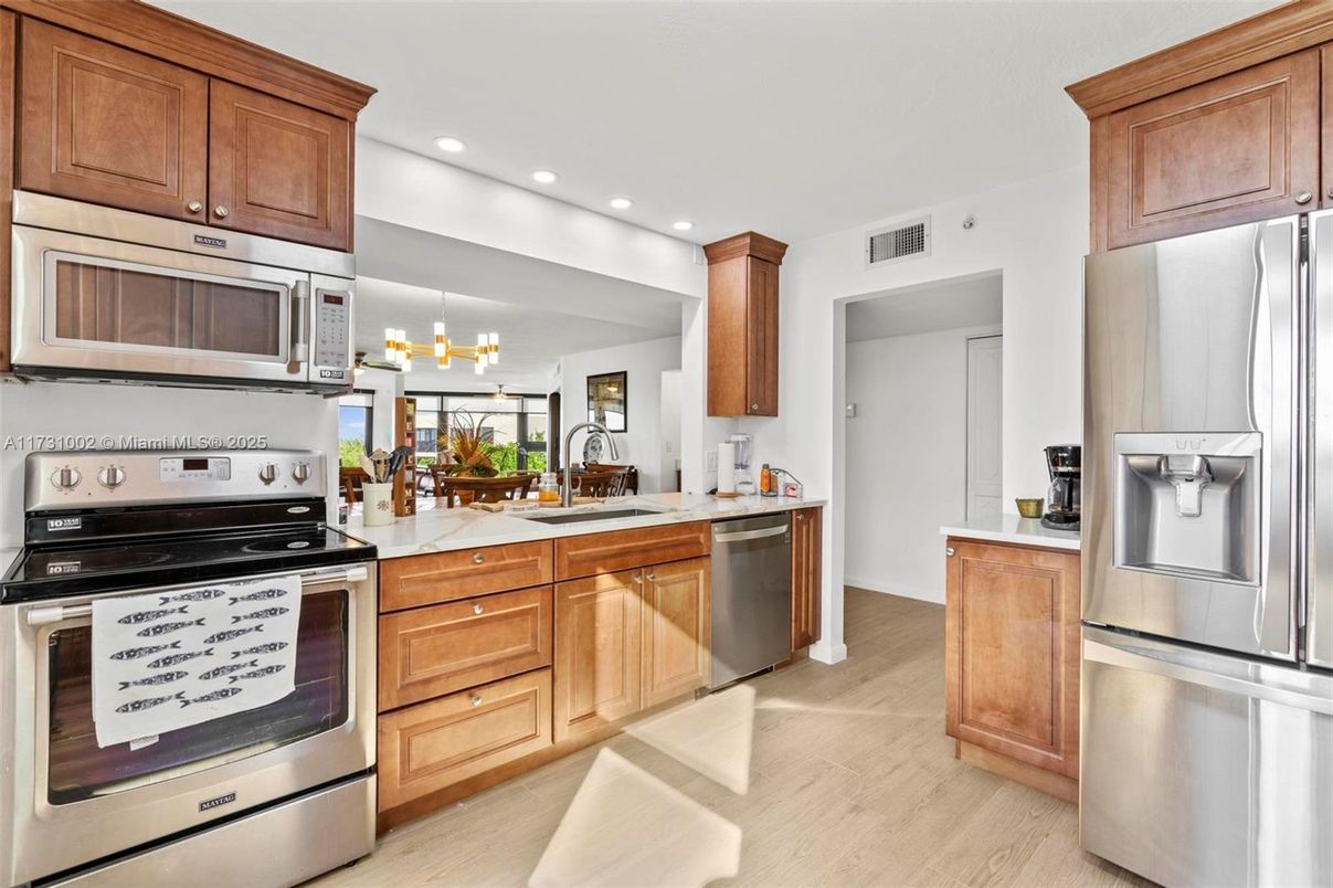Chandelier, Interior, Kitchen, Recessed Lighting, Stainless Steel Appliances, Wood Texture Flooring