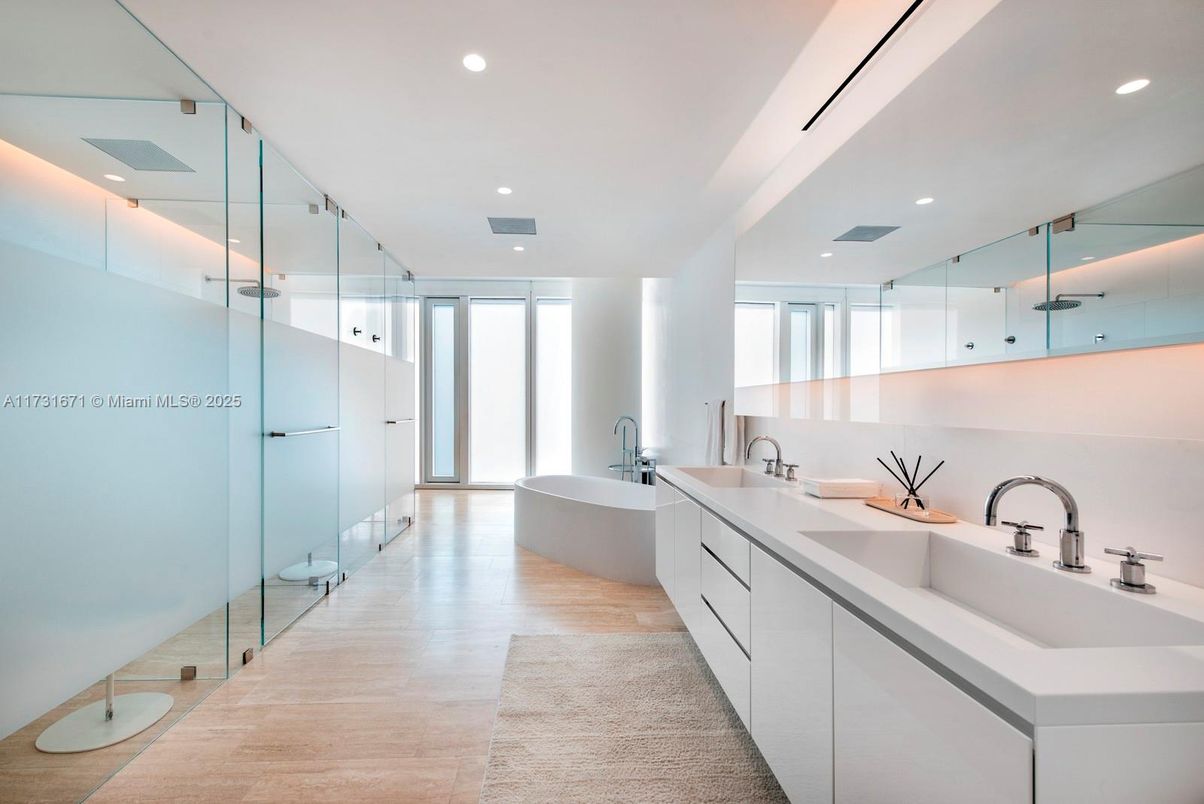 Bathroom, Dual Sink Vanities, Free Standing Baths, Glass Shower, Interior, Recessed Lighting, Wood Texture Flooring