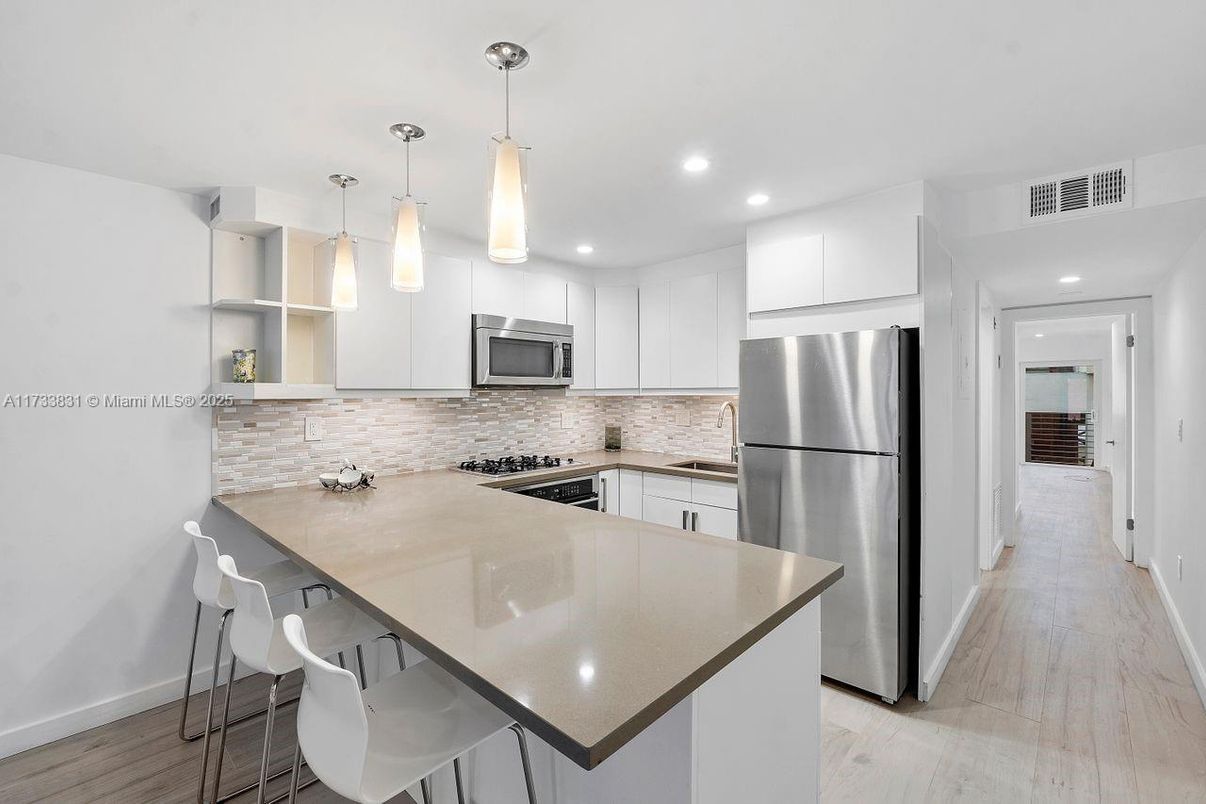 Interior, Kitchen, Pendant Lights, Recessed Lighting, Stainless Steel Appliances, Wood Texture Flooring
