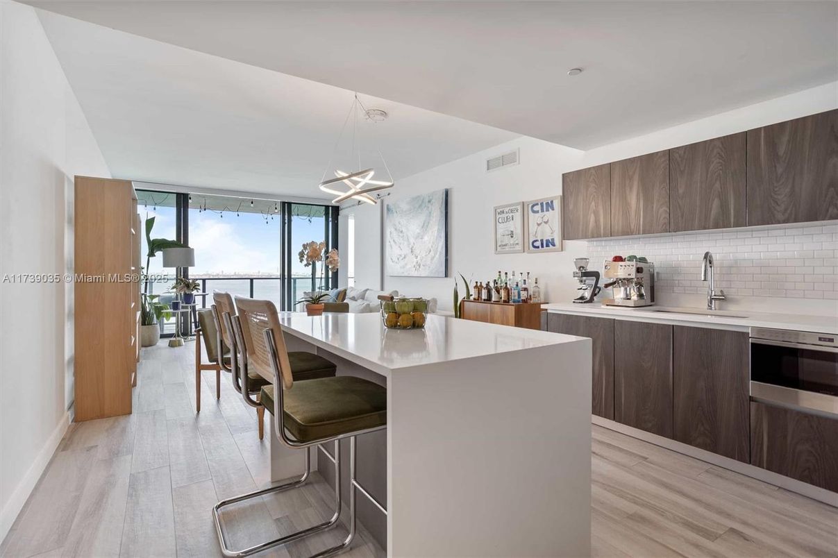 Dining room, Interior, Kitchen, Pendant Lights, Stainless Steel Appliances, Wood Texture Flooring