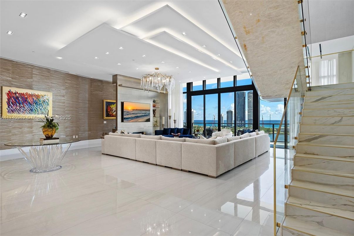 Chandelier, Fireplace, Interior, Living room, Recessed Lighting, Water, Wooden Walls