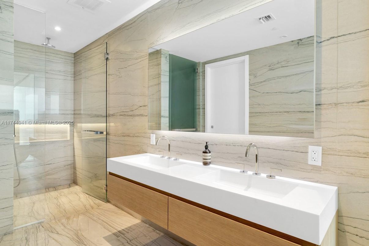 Bathroom, Dual Sink Vanities, Glass Shower, Interior, Marble, Marble Walls, Recessed Lighting
