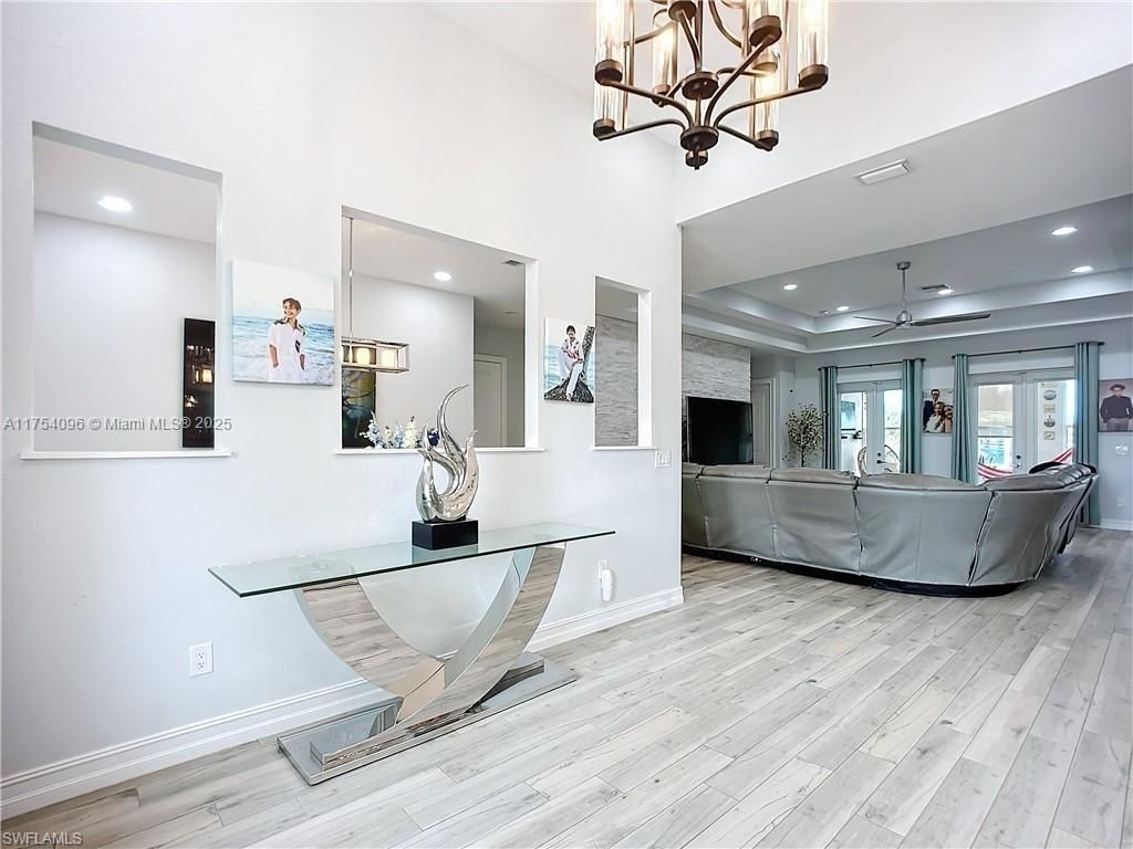 Chandelier, Interior, Living room, Recessed Lighting, Wood Texture Flooring