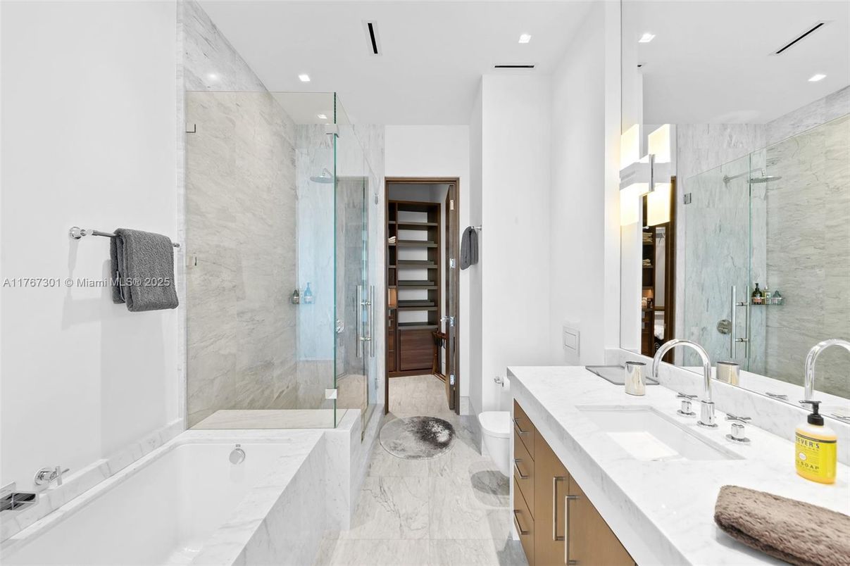 Bathroom, Dual Sink Vanities, Glass Shower, Interior, Marble, Marble Walls, Recessed Lighting