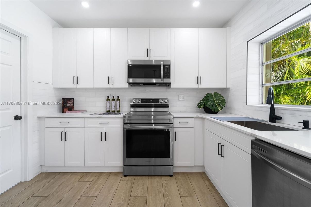 Interior, Kitchen, Recessed Lighting, Stainless Steel Appliances, Wood Texture Flooring