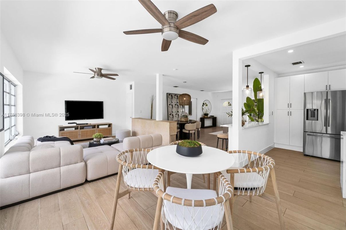 Dining room, Interior, Kitchen, Living room, Pendant Lights, Recessed Lighting, Stainless Steel Appliances, Wood Texture Flooring