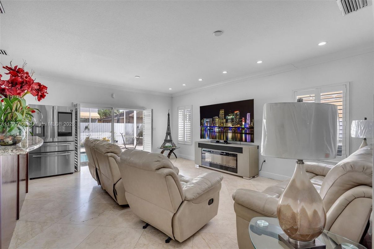 Fireplace, Interior, Kitchen, Living room, Recessed Lighting, Stainless Steel Appliances