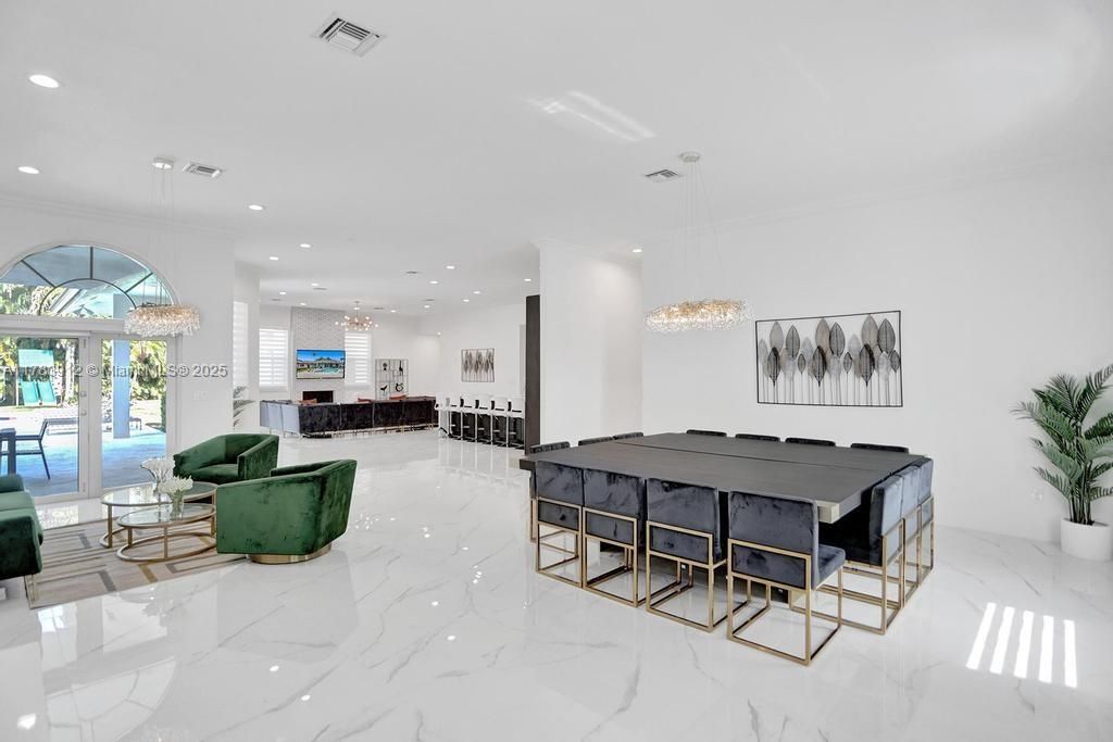 Chandelier, Dining room, Fireplace, Interior, Living room, Marble, Pendant Lights, Recessed Lighting