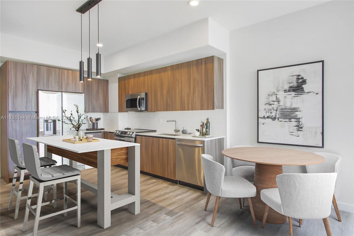 Dining room, Interior, Kitchen, Pendant Lights, Recessed Lighting, Stainless Steel Appliances, Wood Texture Flooring