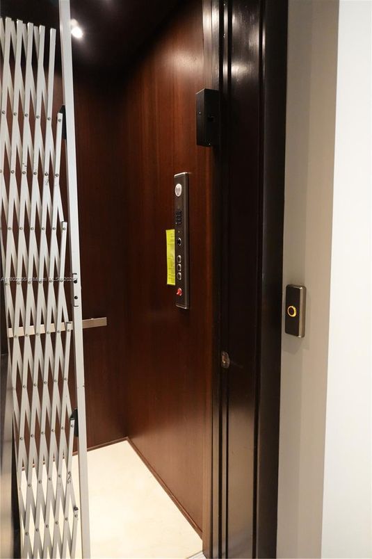 Elevator, Interior, Recessed Lighting, Wooden Walls