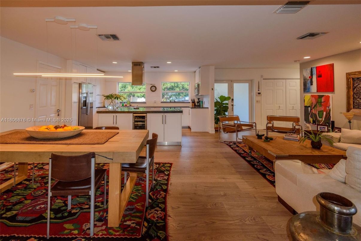 Dining room, Interior, Kitchen, Living room, Pendant Lights, Recessed Lighting, Stainless Steel Appliances, Wood Texture Flooring