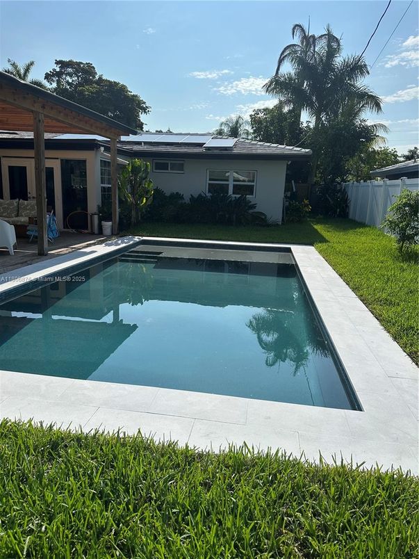 Exterior, Pool, Solar Panels