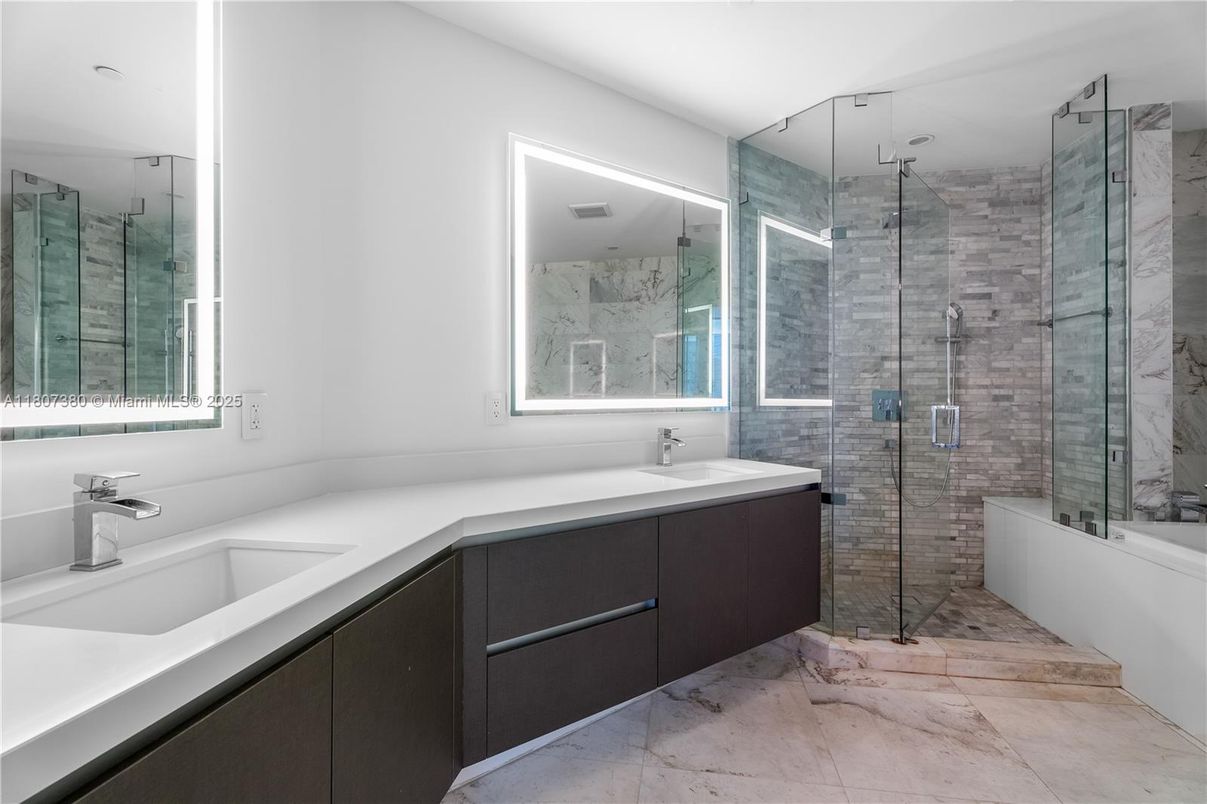 Bathroom, Dual Sink Vanities, Glass Shower, Interior, Marble Walls, Recessed Lighting