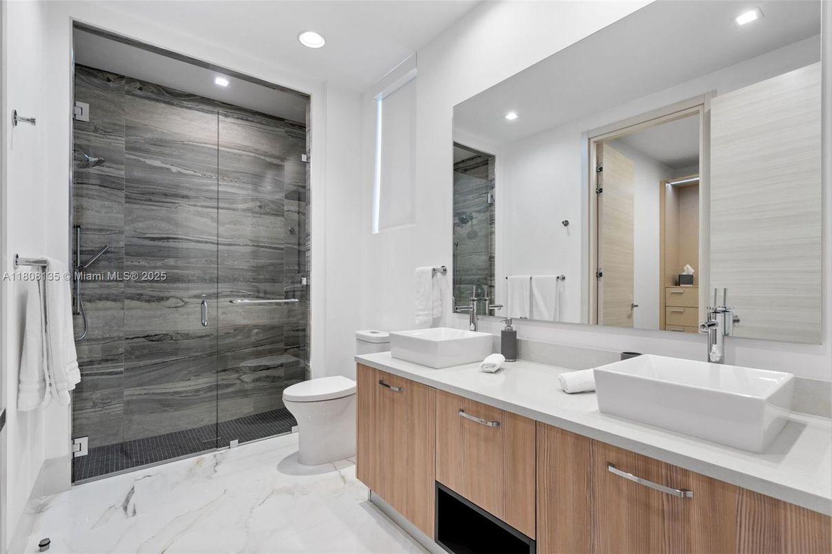 Bathroom, Dual Sink Vanities, Glass Shower, Interior, Marble, Recessed Lighting