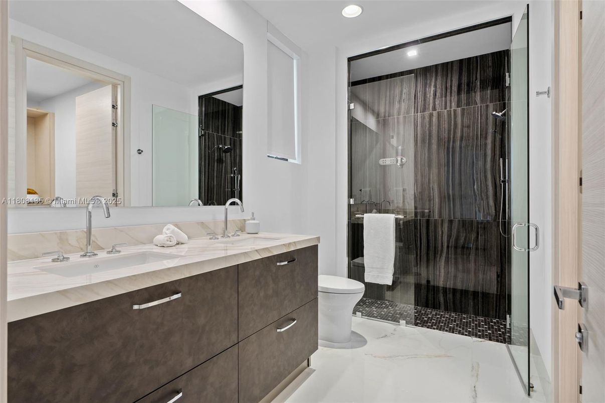 Bathroom, Dual Sink Vanities, Glass Shower, Interior, Marble, Recessed Lighting