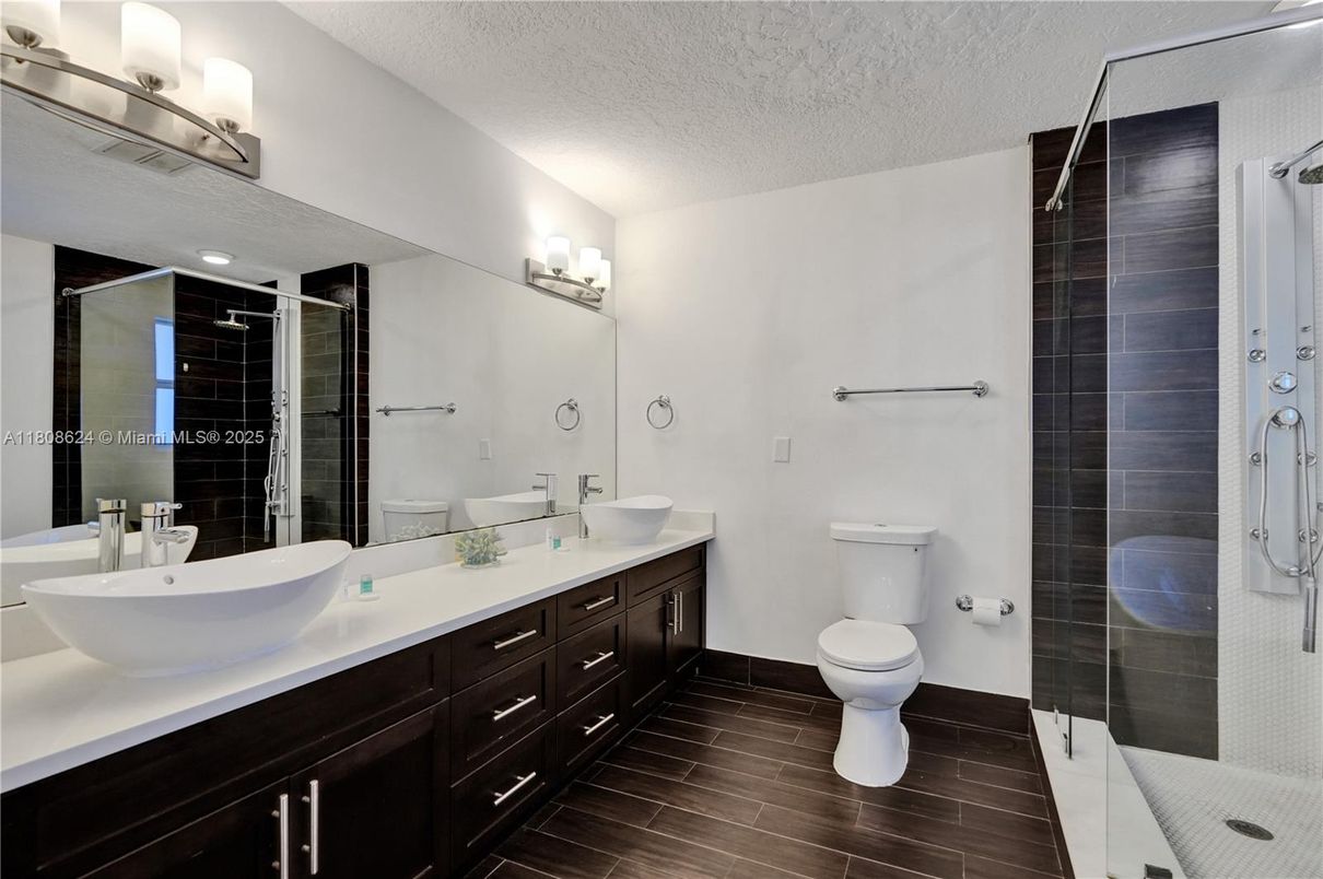 Bathroom, Dual Sink Vanities, Glass Shower, Interior, Wood Texture Flooring