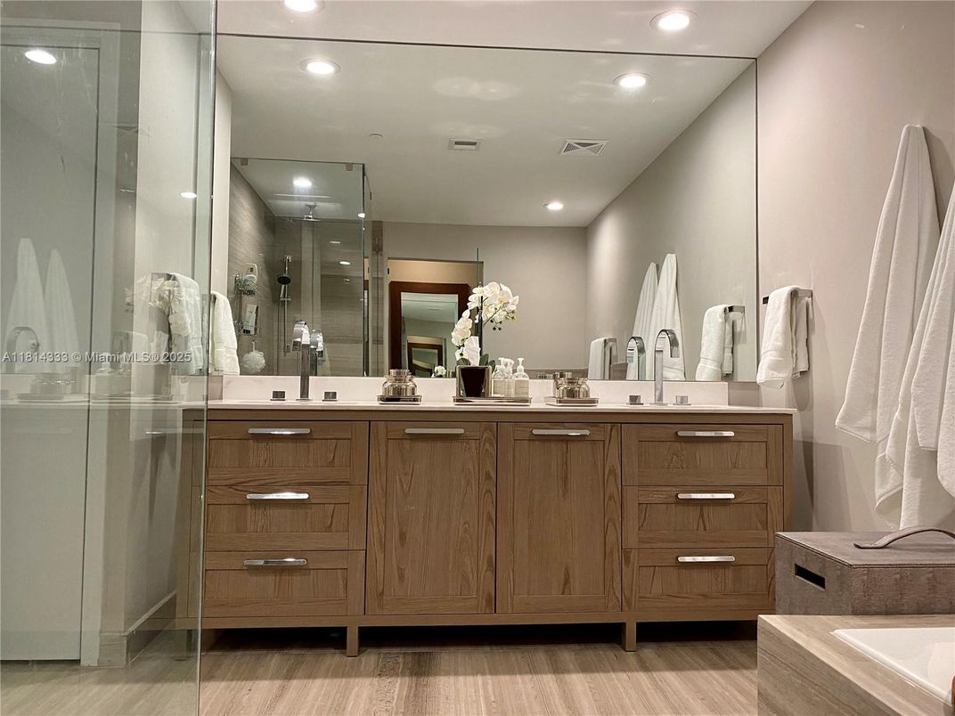 Bathroom, Dual Sink Vanities, Glass Shower, Interior, Recessed Lighting, Wood Texture Flooring