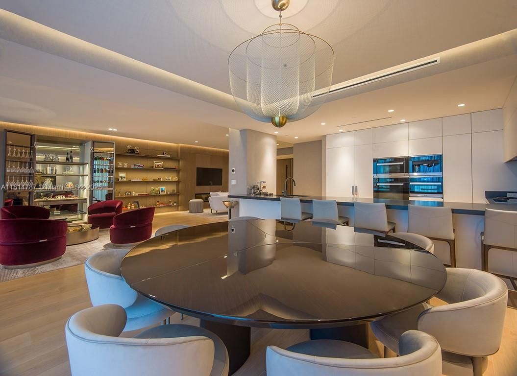 Dining room, Interior, Kitchen, Living room, Recessed Lighting, Stainless Steel Appliances, Wood Texture Flooring