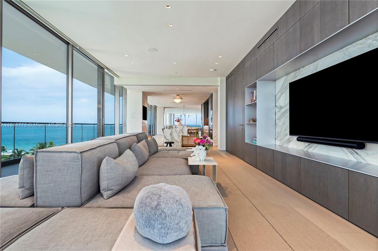 Interior, Living room, Marble Walls, Recessed Lighting, Water, Wood Texture Flooring
