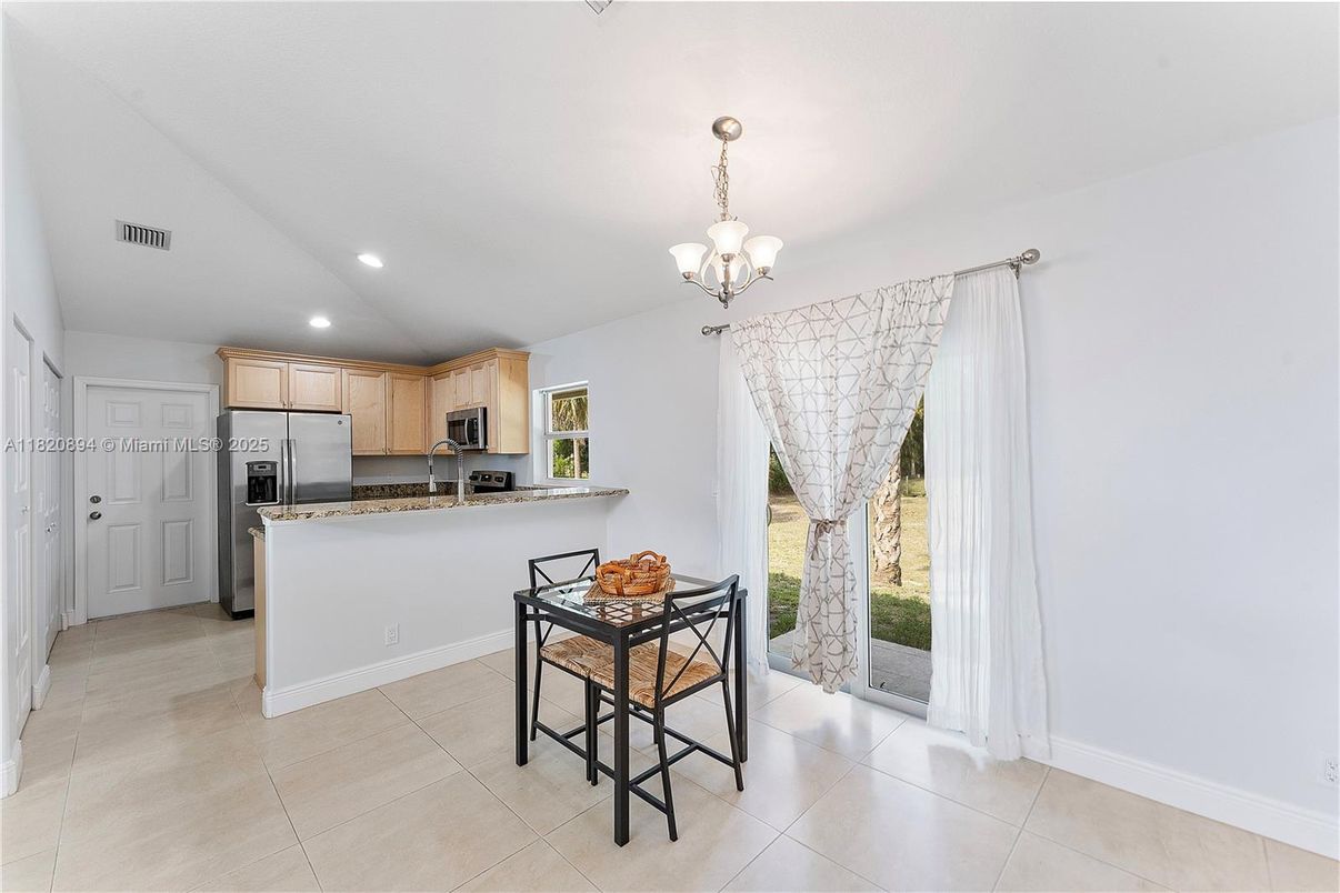 Chandelier, Dining room, Interior, Kitchen, Recessed Lighting, Stainless Steel Appliances