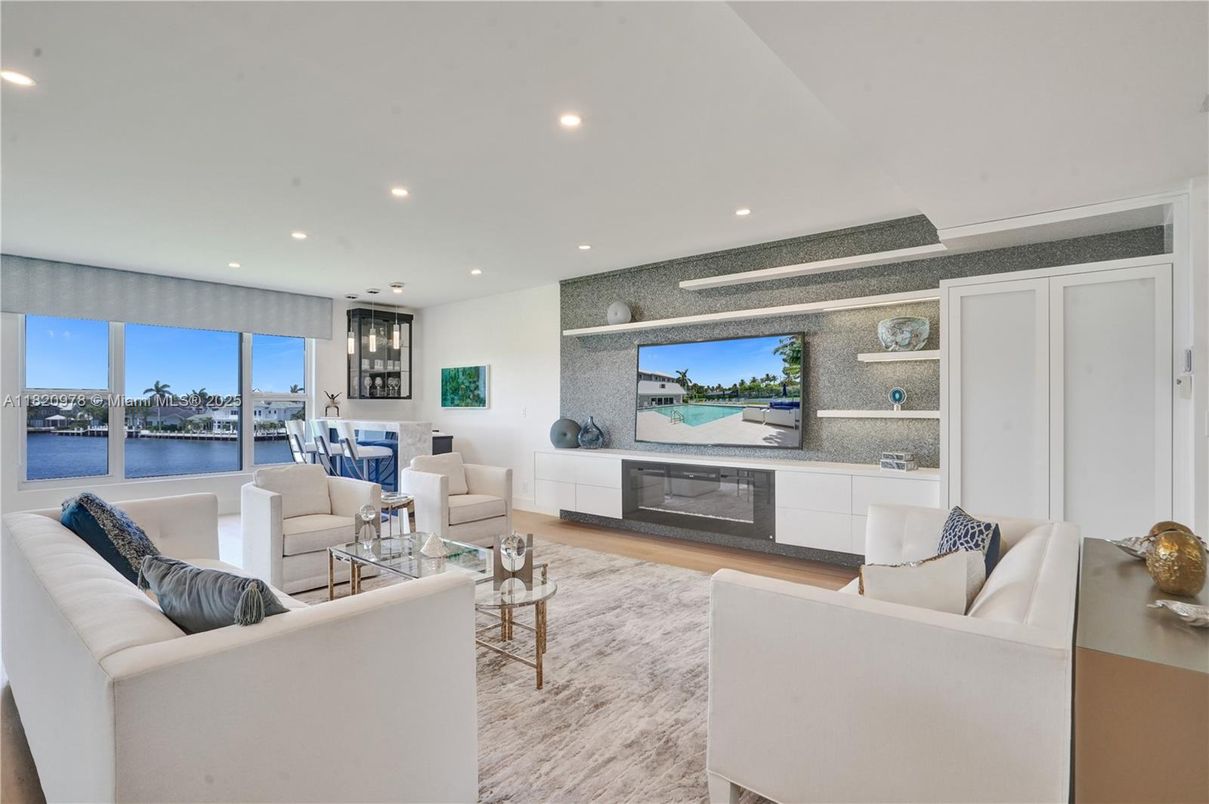 Dining room, Fireplace, Interior, Living room, Recessed Lighting, Water, Wood Texture Flooring