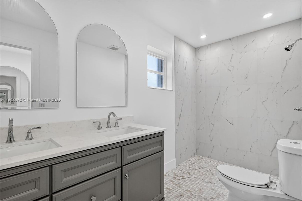 Bathroom, Dual Sink Vanities, Interior, Marble Walls, Recessed Lighting
