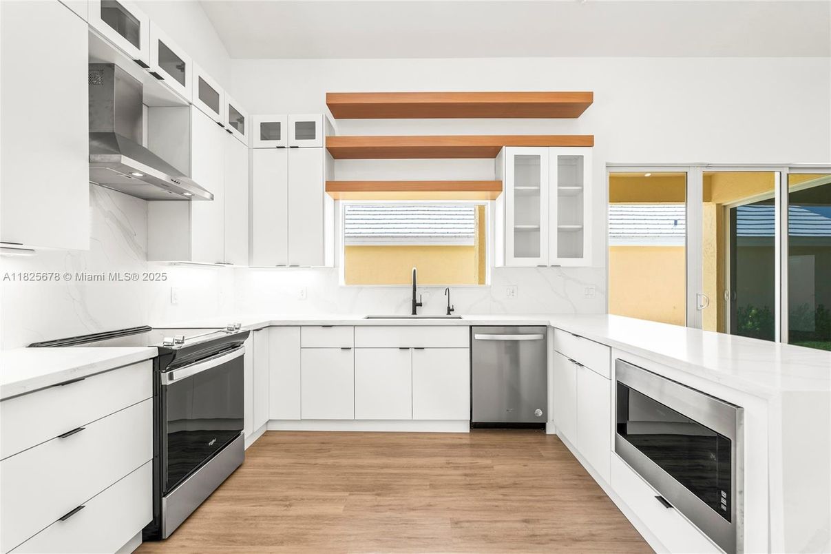 Interior, Kitchen, Marble Walls, Stainless Steel Appliances, Wood Texture Flooring