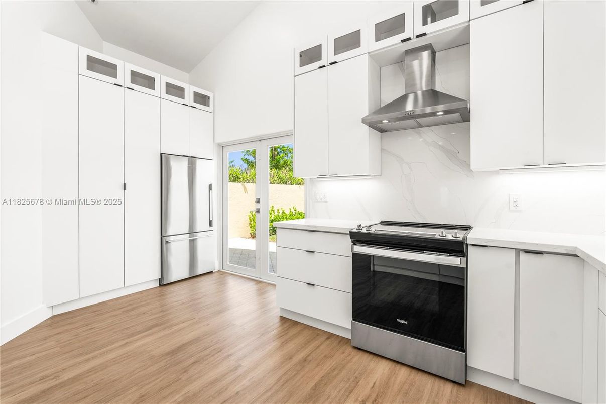 Interior, Kitchen, Marble Walls, Stainless Steel Appliances, Wood Texture Flooring
