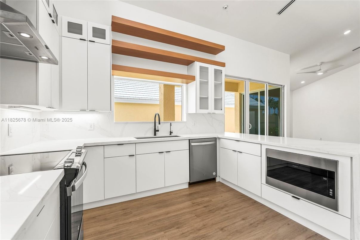 Interior, Kitchen, Recessed Lighting, Stainless Steel Appliances, Wood Texture Flooring