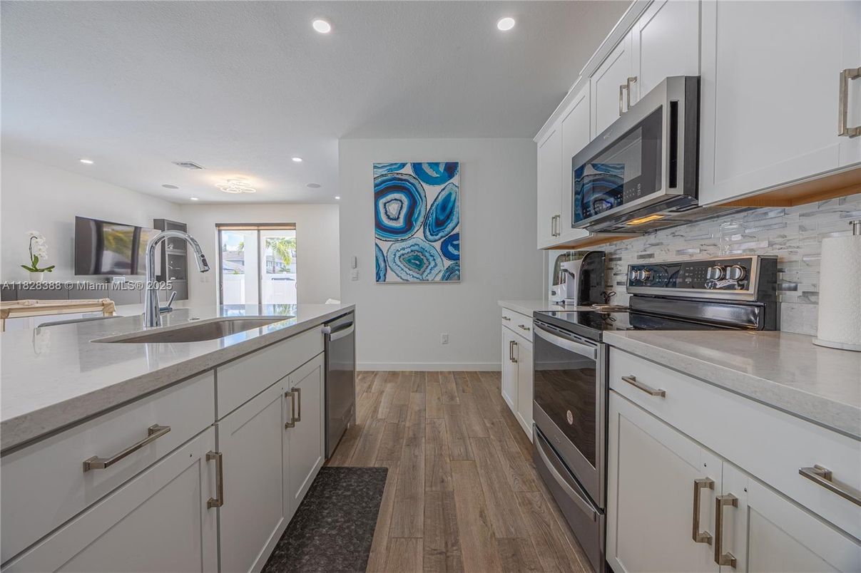 Interior, Kitchen, Recessed Lighting, Stainless Steel Appliances, Wood Texture Flooring