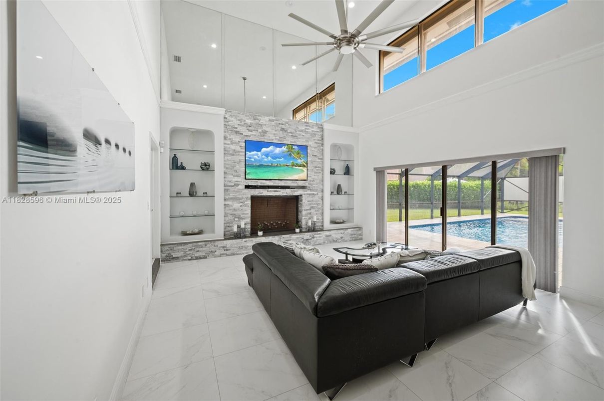Fireplace, Interior, Living room, Marble, Pendant Lights, Recessed Lighting, Stone Walls, Water