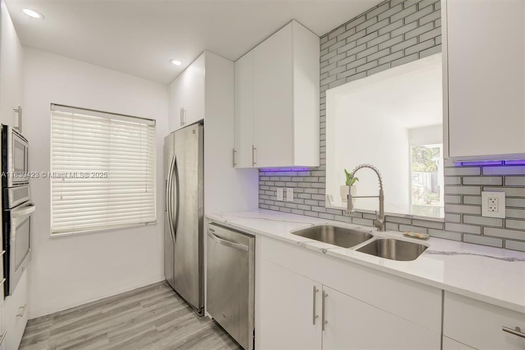 Interior, Kitchen, Recessed Lighting, Stainless Steel Appliances, Wood Texture Flooring