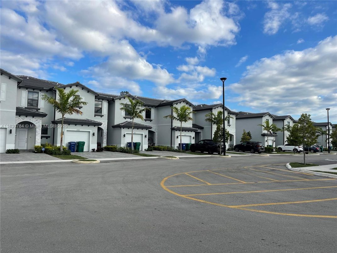 Attached, Exterior, Facade, Spanish Mediterranean