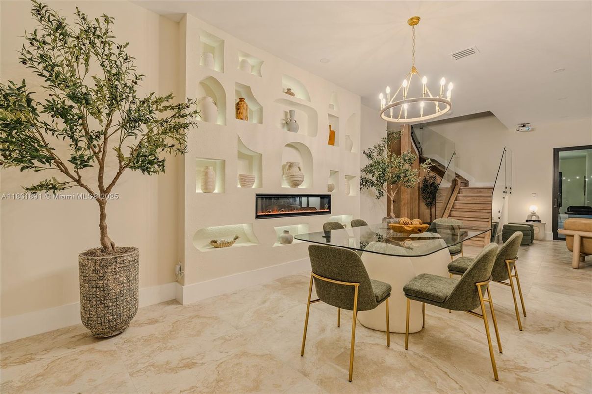 Chandelier, Dining room, Fireplace, Interior, Pendant Lights